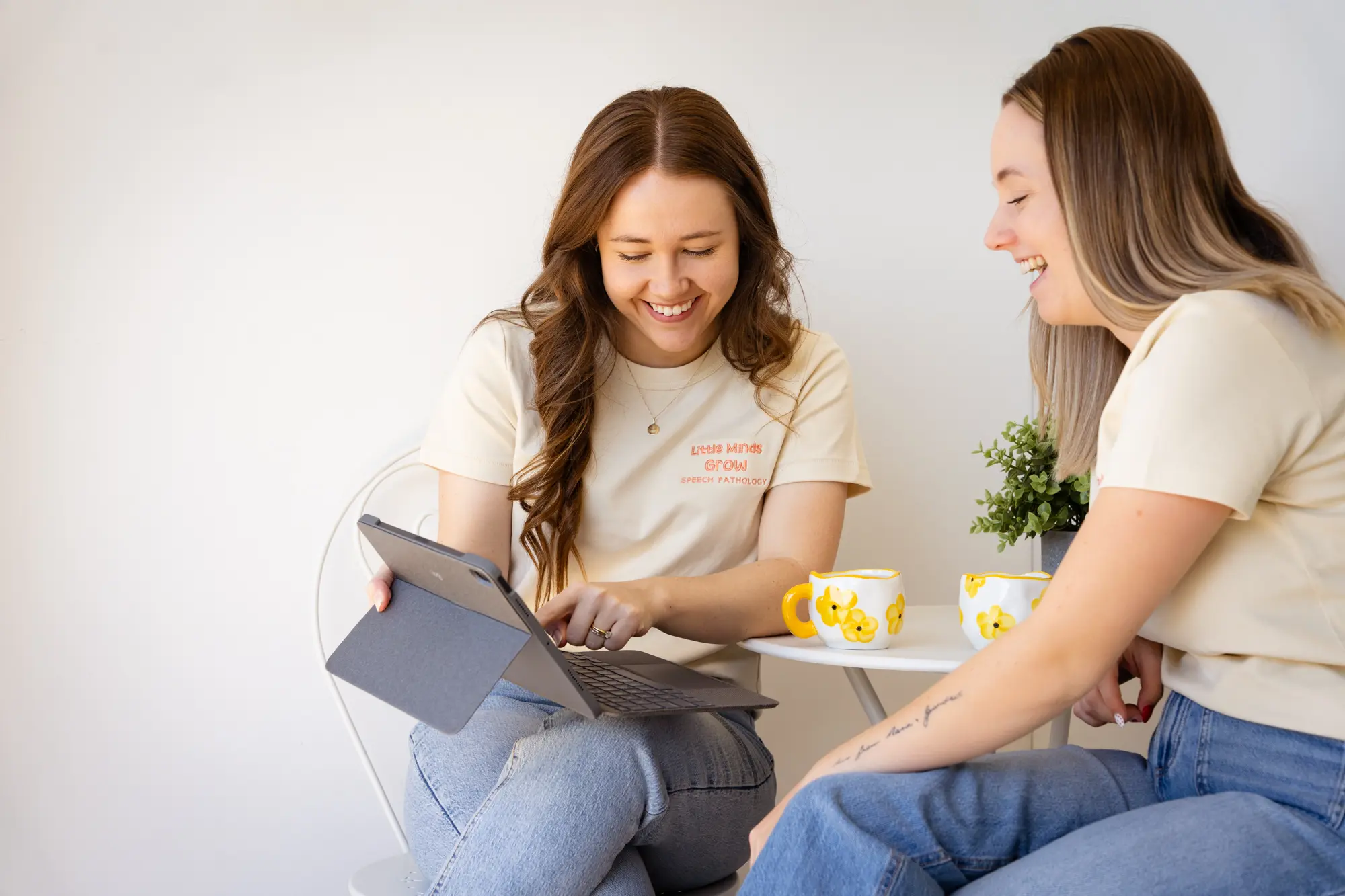 Speech Pathologist reviewing funding options with a parent